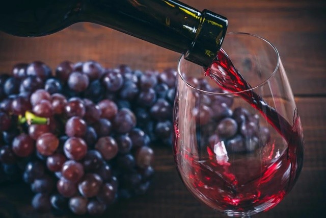 grapes-and-red-wine-glass-1558756234103615806056-1708253768.jpg
