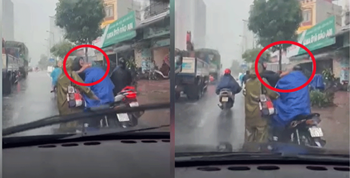 Clip người đàn ông tát liên tiếp vào mặt, dùng tay ghì cổ tài xế xe ôm công nghệ giữa trời mưa