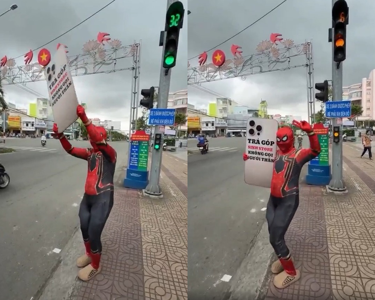 Xử lý \'người nhện\' mặc đồ bó sát, cầm biển quảng cáo \'uốn éo\' giữa cột đèn giao thông ở Cà Mau