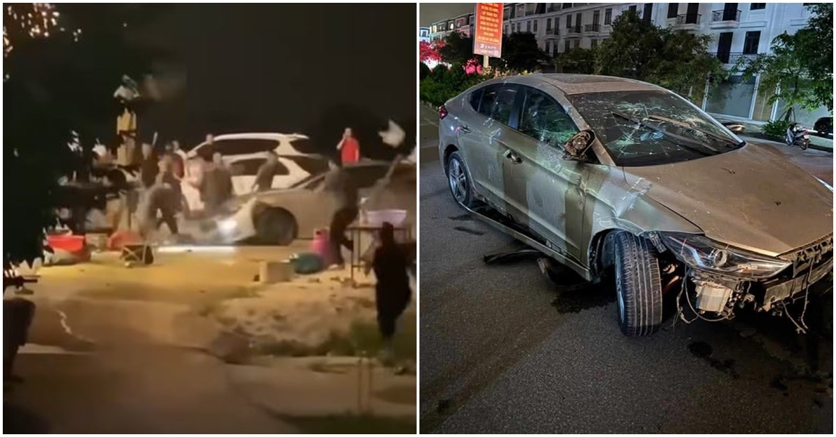 Xôn xao clip hỗn chiến giữa ô tô ‘điên’ và hàng chục người: Ô tô tông trực diện, bị nhiều người ném gạch đá, tấn công