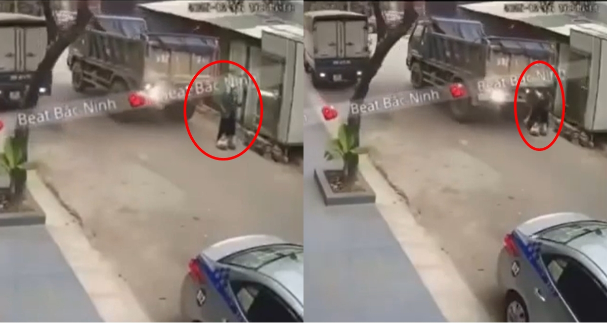 Rụng rời khoảnh khắc xe tải lùi, cán trúng người phụ nữ đang nghe điện thoại đứng bên đường