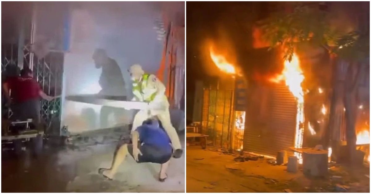 Nghẹt thở khoảnh khắc CSGT ph&aacute; cửa cứu 11 người mắc kẹt trong ng&ocirc;i nh&agrave; ch&aacute;y dữ dội ở Nghệ An