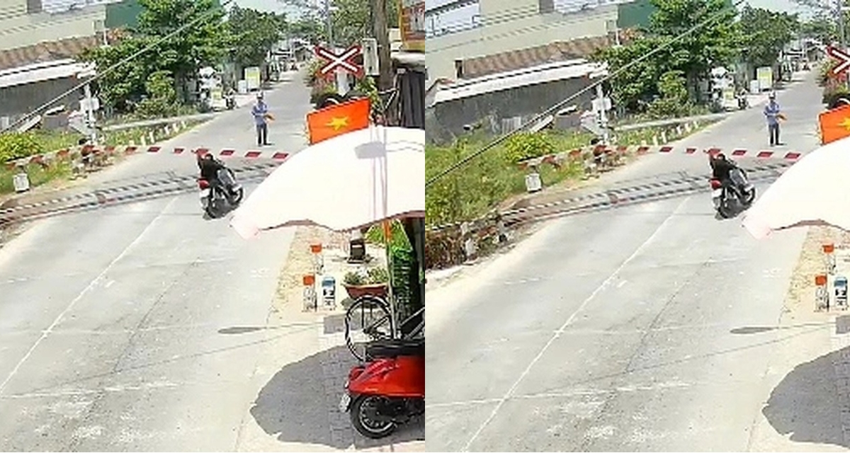 Quảng Ng&atilde;i: Người đ&agrave;n &ocirc;ng t&ocirc;ng g&atilde;y đ&ocirc;i g&aacute;c chắn t&agrave;u, nh&acirc;n vi&ecirc;n đường sắt cứu người rồi \'tặng\' cho c&uacute; đ&aacute;