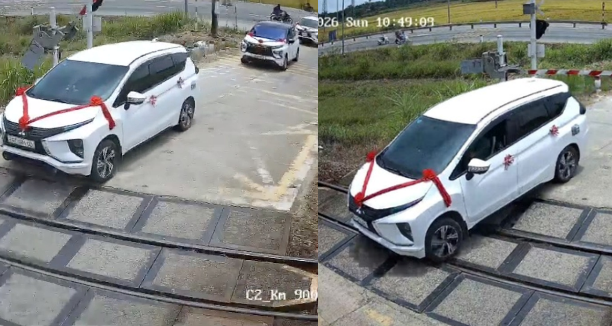 Xe rước d&acirc;u mắc kẹt tr&ecirc;n đường ray khi t&agrave;u đang tới v&igrave; vượt r&agrave;o chắn, t&agrave;i xế h&eacute; lộ th&ocirc;ng tin bất ngờ