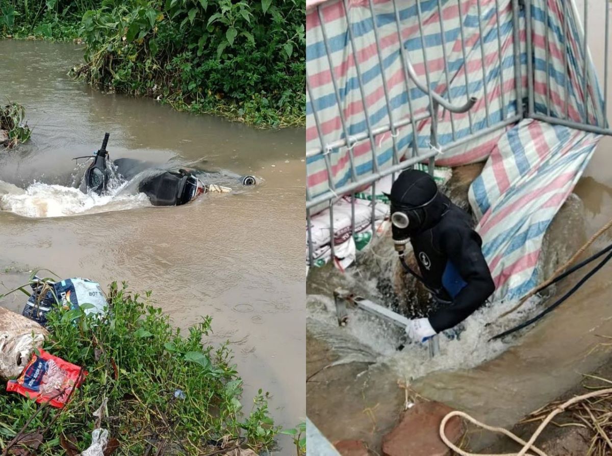 Hiện trường t&igrave;m kiếm nam sinh vi&ecirc;n nghi bị nước cuốn xuống cống ở H&agrave; Nội