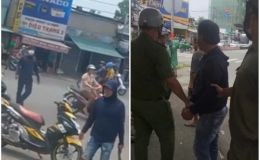Làm rõ nguyên nhân một người đàn ông trùm mặt kín mít, vác rựa đe dọa người đi đường ở TP.HCM