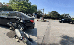 Camera ghi lại cảnh 2 thiếu niên lớp 9 không đội mũ bảo hiểm tông mạnh vào xe ô tô sang ở Hà Nội