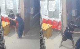 Camera ghi lại cảnh tượng nữ y tá bị nam thanh niên giả bệnh vào khám rồi túm cổ, đe dọa cướp tiền