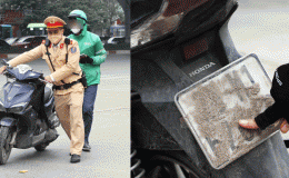 Muôn vàn cách ‘né’ camera AI ở Hà Nội: Có tài xế dùng cát, xi măng hoặc bã kẹo cao su để che