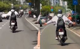 Làm rõ danh tính nam thanh niên lái xe máy buông 2 tay ở TP.HCM, bị xử lý ra sao? 