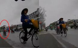 Camera ghi lại cảnh thanh niên cắm mặt vào điện thoại, tông người phụ nữ đi xe đạp ngã văng ra đường
