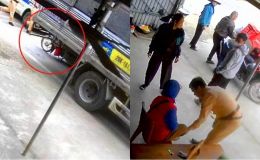 Nữ shipper bị cuốn vào gầm xe tải vì mải nghe điện thoại, camera ghi lại khoảnh khắc được CSGT cứu sống