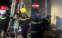 Hà Nội: Cháy nhà dân tại phố Nguyễn Khang, cảnh sát cứu 3 người mắc kẹt trong gang tấc