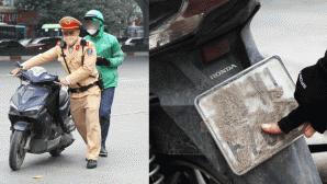 Muôn vàn cách ‘né’ camera AI ở Hà Nội: Có tài xế dùng cát, xi măng hoặc bã kẹo cao su để che