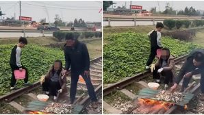 Xôn xao clip ghi lại cảnh 1 nam 1 nữ thản nhiên nướng đồ ăn trong đường tàu