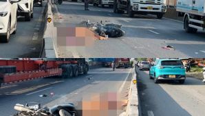 Hiện trường tai nạn xe máy và xe đầu kéo tại Xa lộ Hà Nội khiến 1 người tử vong, 1 người nguy kịch