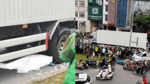 Hiện trường xe máy cuốn vào gầm xe tải ở Phạm Văn Đồng, Hà Nội: Danh tính cô gái trẻ tử vong tại chỗ? 