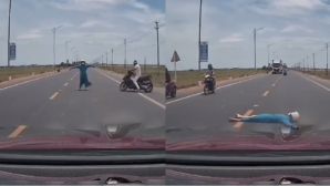 Người phụ nữ lao ra chặn đầu ô tô rồi nằm giữa đường, camera ghi lại hành động lạ của người đàn ông đi cùng