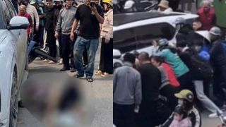 Hiện trường ô tô lùi khiến 2 người thương vong ở Hà Nội: Hàng chục người vây quanh cứu nạn nhân