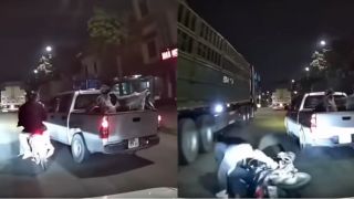 Camera ghi lại khoảnh khắc xe máy chở theo trẻ nhỏ bị xe bán tải ép ngã, suýt bị xe tải cán qua