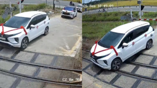 Xe rước dâu mắc kẹt trên đường ray khi tàu đang tới vì vượt rào chắn, tài xế hé lộ thông tin bất ngờ