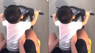 Diễn biến nóng vụ clip anh trai thản nhiên để em mới 2 tuổi cầm lái xe máy gây bức xúc dư luận