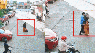 Pha xử lý gây xôn xao MXH: Clip nam bảo vệ chạy ra bế người phụ nữ mải nghe điện thoại, chắn lối ô tô đi