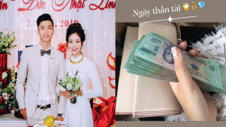 Vợ Phan Văn Đức cầm xấp tiền mua vàng ngày thần tài, tiện khoe luôn quà `khủng` chồng tặng