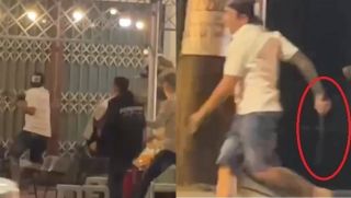 Kinh hãi clip người đàn ông cầm mã tấu rượt chém khách ở phố đi bộ TP.HCM, hé lộ lý do khó tin