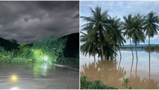 Thót tim cảnh ô tô bị cuốn trôi giữa dòng lũ, 2 người bám vào bụi tre thoát chết trong gang tấc