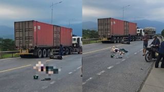 Hiện trường kinh hoàng vụ ô tô tải va chạm xe máy trên quốc lộ 1: Xác định danh tính hai người tử vong tại chỗ