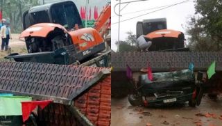 Hiện trường kinh hoàng vụ xe tải chở xe múc làm sập cổng chào ở Đà Nẵng, 2 người tử vong thương tâm