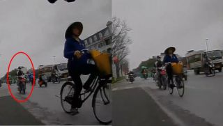 Camera ghi lại cảnh thanh niên cắm mặt vào điện thoại, tông người phụ nữ đi xe đạp ngã văng ra đường