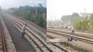 Người đàn ông cố lao nhanh qua đường sắt khi tàu đi đến, camera ghi lại cảnh thoát chết trong gang tấc