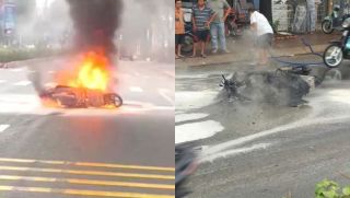 Xe máy bốc cháy trơ khung giữa đường TPHCM: Người lái hốt hoảng quăng xe thoát thân, hé lộ nguồn cơn