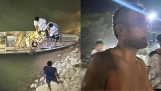 Khoảnh khắc nghẹt thở: Người đàn ông bất chấp nguy hiểm lao xuống sông Lam cứu hai mẹ con 