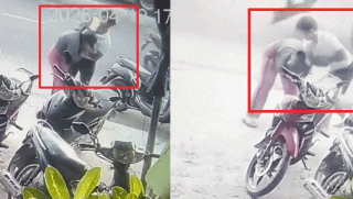 Camera cảnh người đàn ông bất ngờ áp sát xe, lao vào hành hung người phụ nữ không quen biết giữa phố