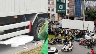 Hiện trường xe máy cuốn vào gầm xe tải ở Phạm Văn Đồng, Hà Nội: Danh tính cô gái trẻ tử vong tại chỗ? 