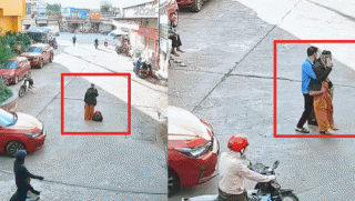 Pha xử lý gây xôn xao MXH: Clip nam bảo vệ chạy ra bế người phụ nữ mải nghe điện thoại, chắn lối ô tô đi