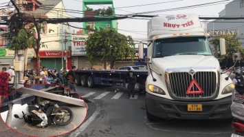 Nữ sinh đi Honda Air Blade thoát chết gang tấc dưới gầm xe container khiến dân tình hú hồn ảnh 1