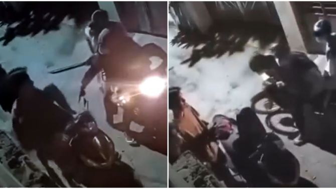 Clip nhóm cướp cầm hung khí rượt đuổi 2 thanh niên đến tận cổng nhà, sững sờ khi thấy 1 vật trong cốp xe