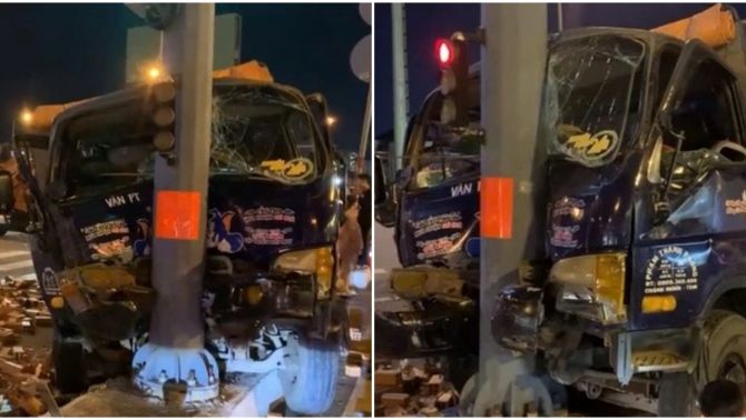 Thót tim pha giải cứu tài xế mắc kẹt trong cabin nát bét sau tai nạn tông trụ đèn giao thông làm 2 người bị thương