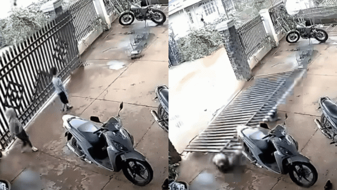 Camera ghi lại cảnh cánh cửa sắt đổ rầm trong lúc 2 bé trai đang đóng cửa khiến người xem thót tim