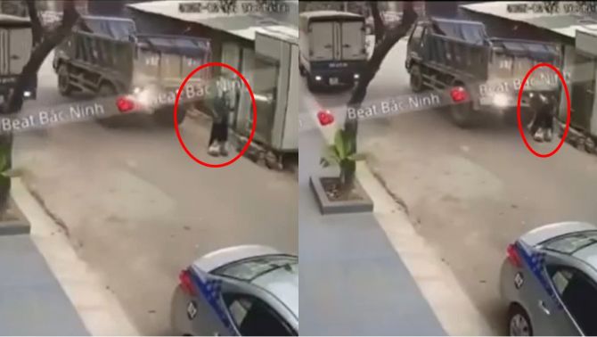 Rụng rời khoảnh khắc xe tải lùi, cán trúng người phụ nữ đang nghe điện thoại đứng bên đường