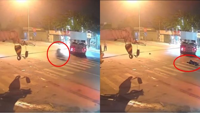Clip 2 xe cẩu kéo nhau quay đầu, xe máy vướng dây bị hất tung, cảnh tượng ám ảnh khiến tất cả rụng rời