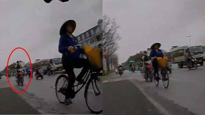 Camera ghi lại cảnh thanh niên cắm mặt vào điện thoại, tông người phụ nữ đi xe đạp ngã văng ra đường