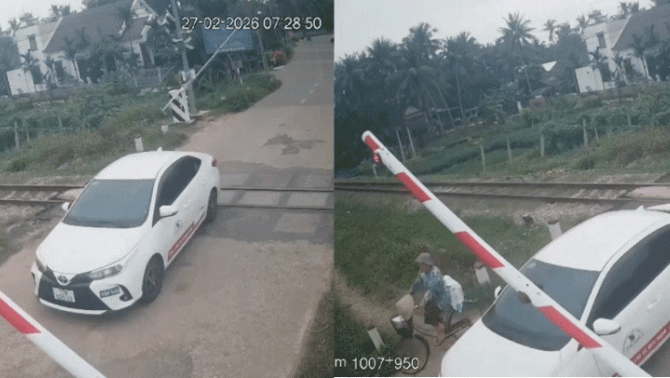 Tài xế ô tô tập lái bị xử phạt khi bất chấp vượt qua đường sắt lúc đèn đỏ đã bật và cần chắn đang hạ