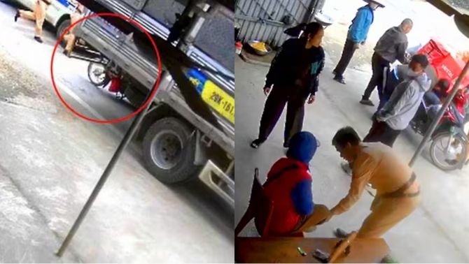 Nữ shipper bị cuốn vào gầm xe tải vì mải nghe điện thoại, camera ghi lại khoảnh khắc được CSGT cứu sống