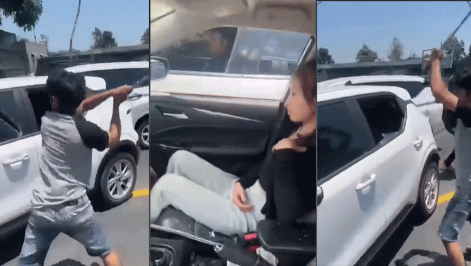 Nguồn cơn khiến nam thanh niên chặn xe taxi chở vợ, điên cuồng đập phá gây xôn xao