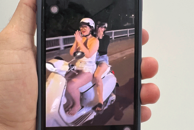 Thong-tin-nong-vu-co-gai-lai-xe-vespa-buong-hai-tay-vai-lay-nguoi-dang-quay-video-o-tphcm